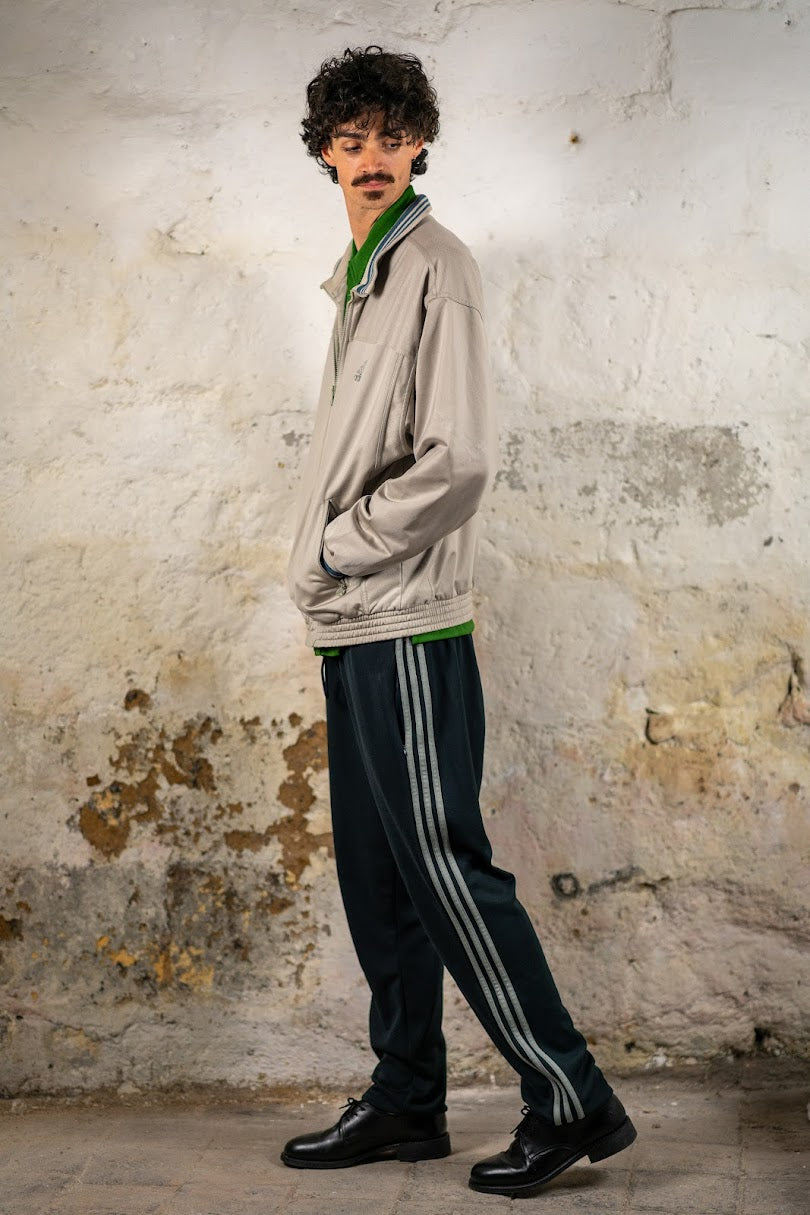 Silver track jacket, in profile
